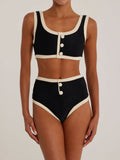 Black ribbed knit bikini top with cream trim and button details, paired with matching high-waisted bikini bottoms.