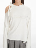 Off-white mock neck asymmetrical long sleeve top with a bow detail on the shoulder and embroidered graphic on the chest. - View 6 | WEUXS