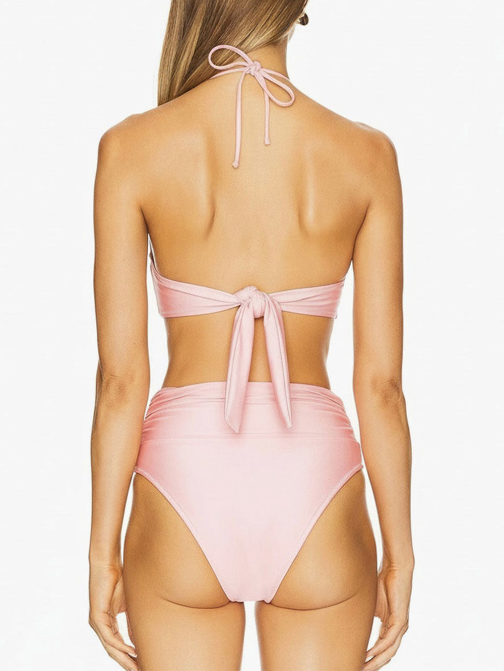 Close-up of pearl embellishment on pink bikini top