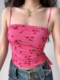 Pink mesh crop top with all-over cherry print and square neckline.