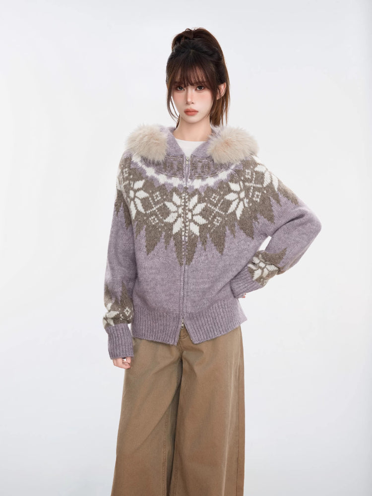 Woman wearing a lavender knit zip-up cardigan with a beige Fair Isle pattern and faux fur hood.