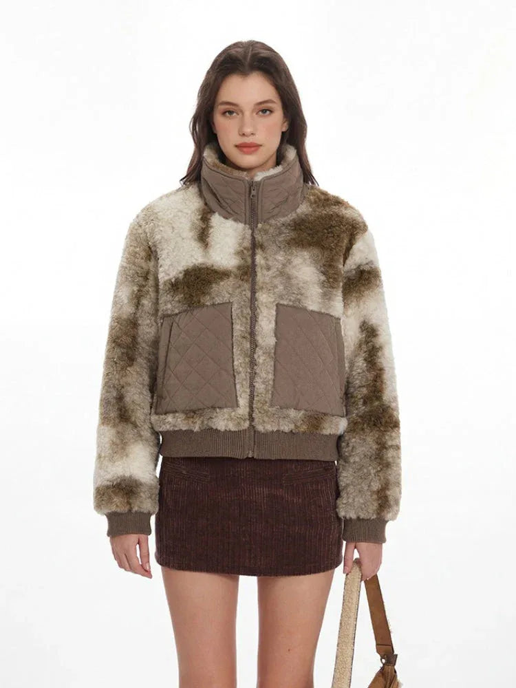 Front view of a woman in a patterned faux fur jacket