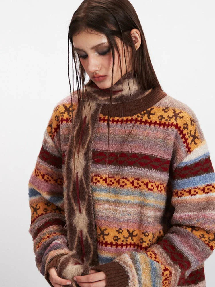Detailed view of the knit texture and patterns on the woman's sweater.