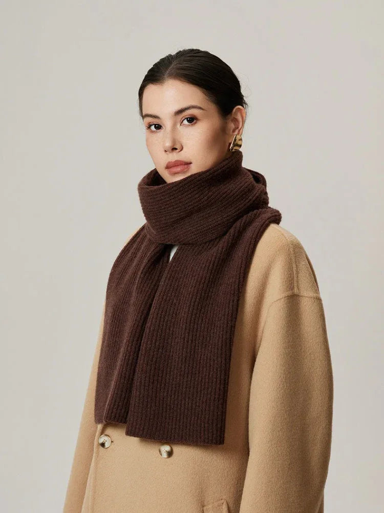 Woman wearing a dark brown ribbed knit scarf