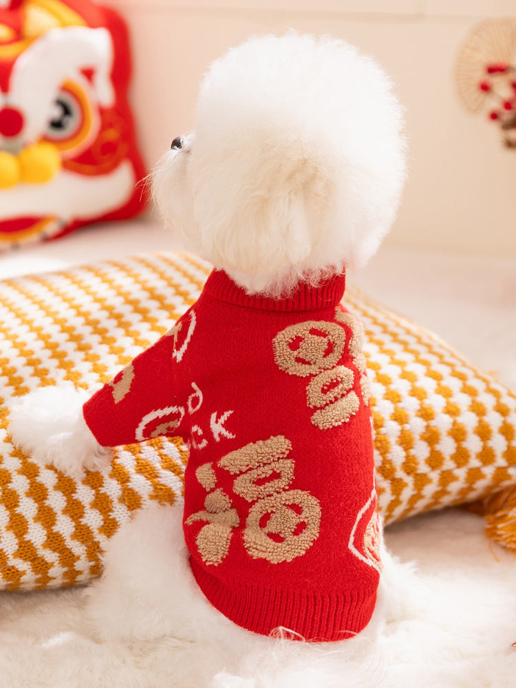 Back view of a small white dog wearing a red knit sweater with Chinese characters
