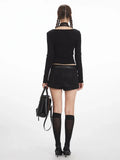 back view of black long sleeve top