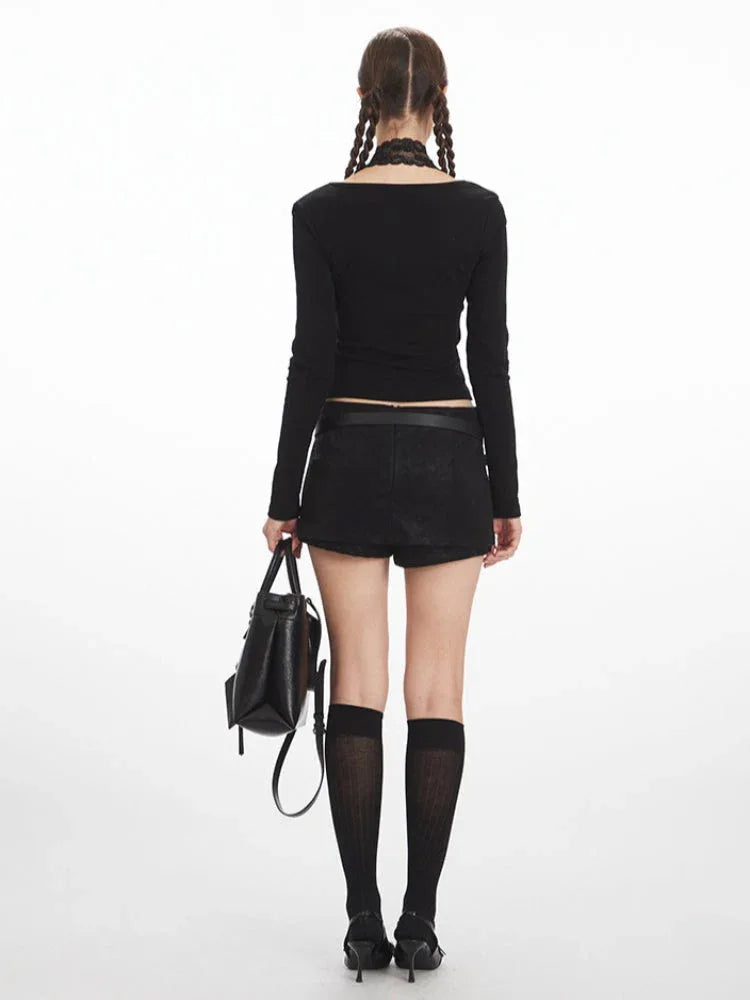 back view of black long sleeve top