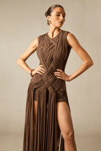 Front view of a sleeveless brown maxi dress with intricate braiding