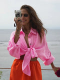 Woman wearing a white oversized cotton button down shirt - View 13 | WEUXS