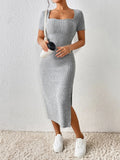 Close-up of the ribbed texture on a grey midi dress