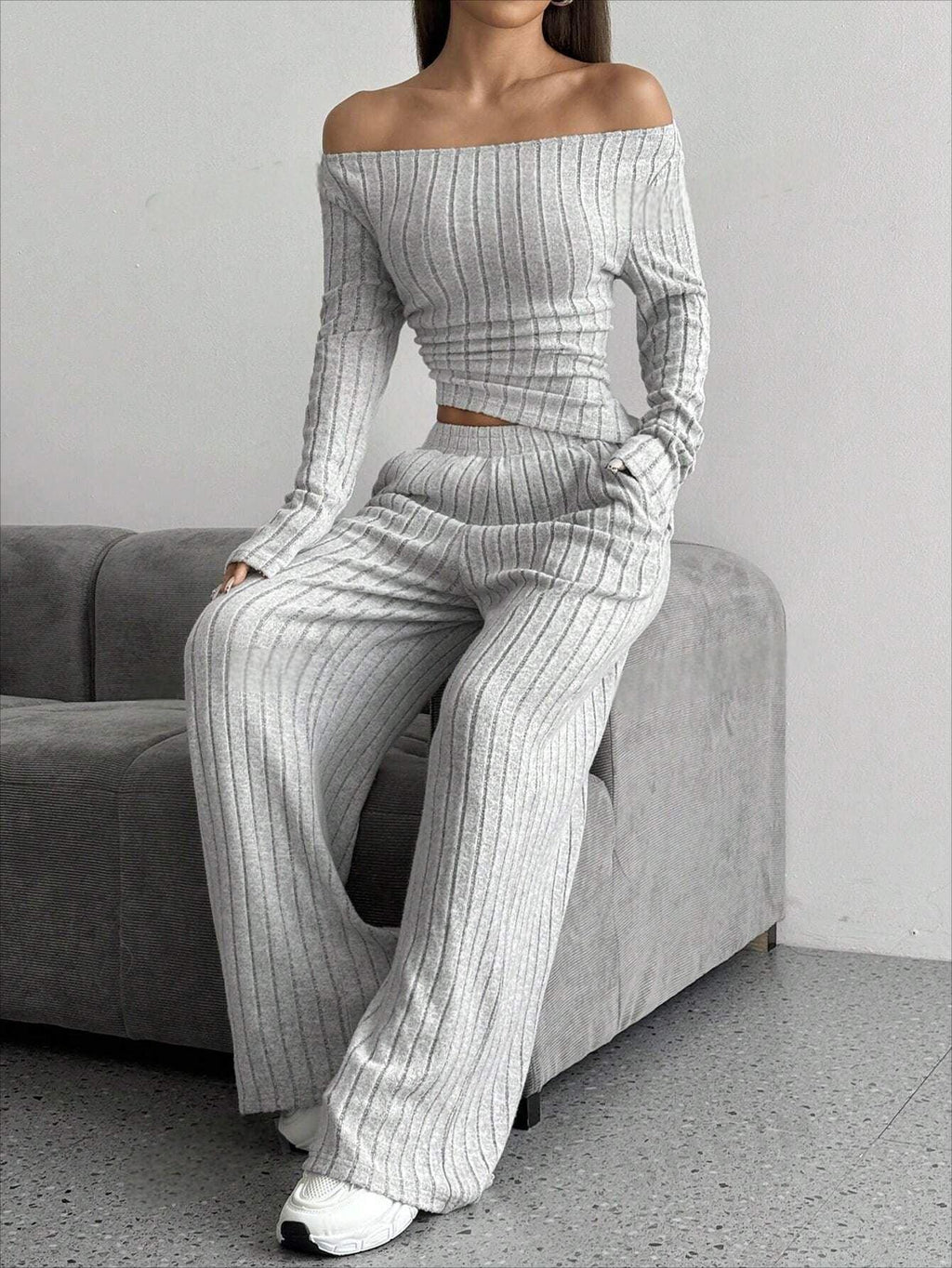 Woman wearing a grey ribbed knit two-piece loungewear set