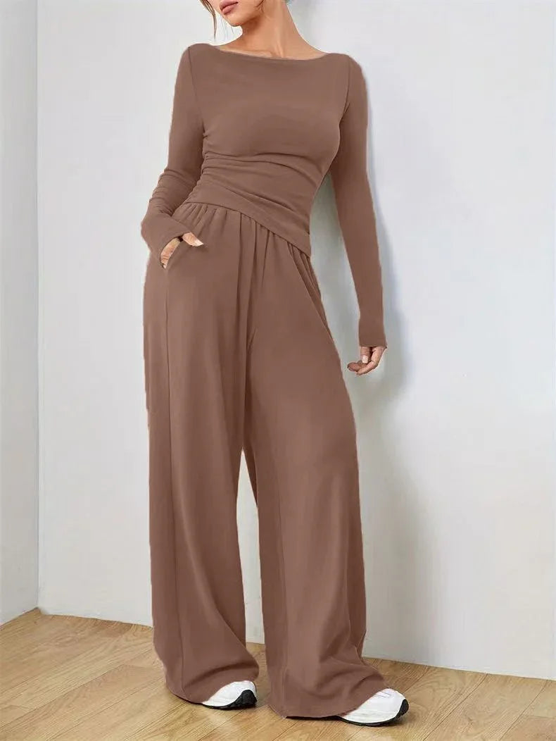 Woman in a brown boat neck loungewear set with pockets