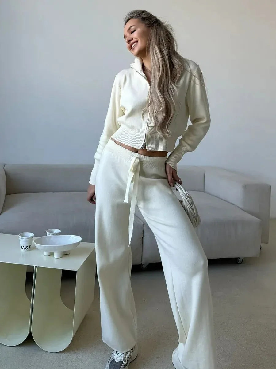 Full length view of ivory knit set on model
