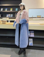 Woman wearing a pink and blue colorblock faux fur coat