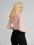 Woman wearing a white ribbed mock neck sweater - View 19 | WEUXS