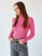 Woman wearing a white ribbed mock neck sweater - View 48 | WEUXS