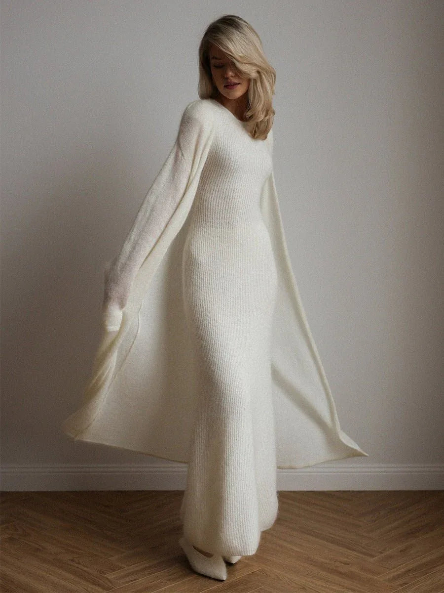 Woman in a white ribbed knit maxi dress and open-front long cardigan
