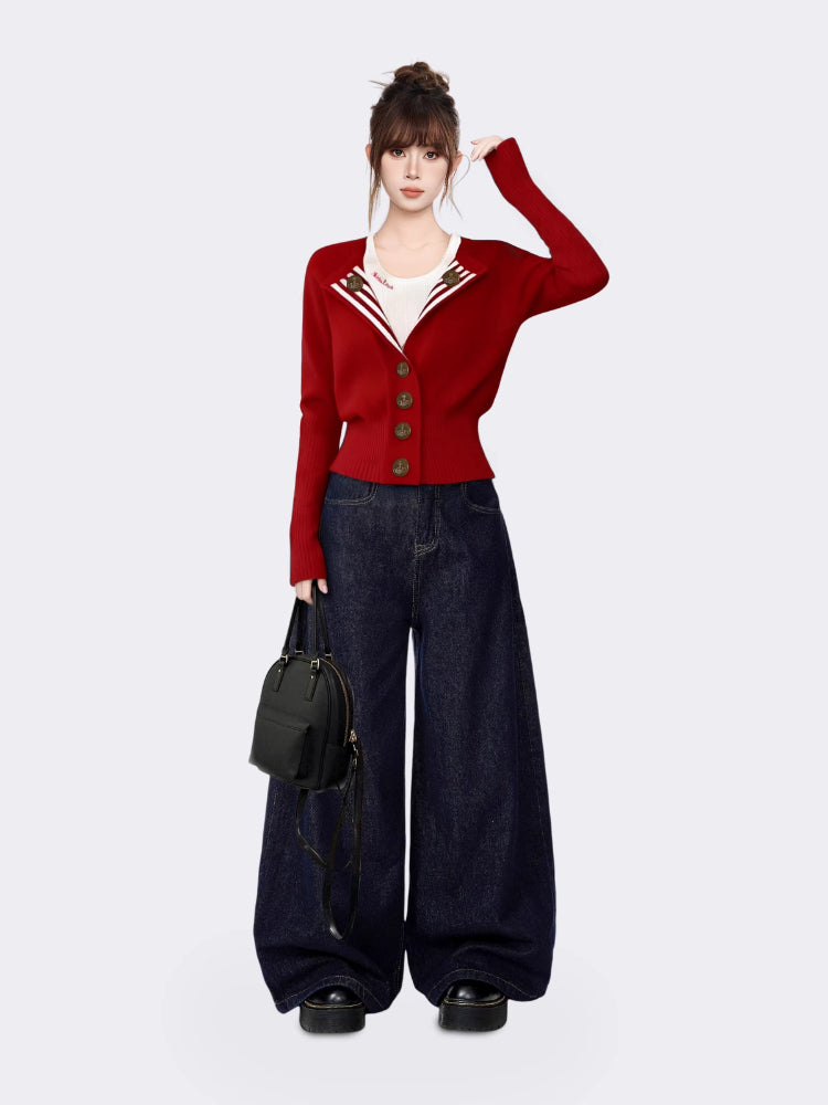 Full outfit of woman wearing red striped lapel cardigan with dark wide-leg jeans