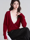 Full outfit view of the red knit cardigan and cami set