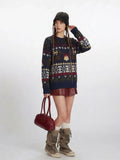 Woman adjusting her beanie while wearing a navy blue Fair Isle knit sweater and red mini skirt.
