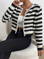Front view of a black and white striped cropped cardigan