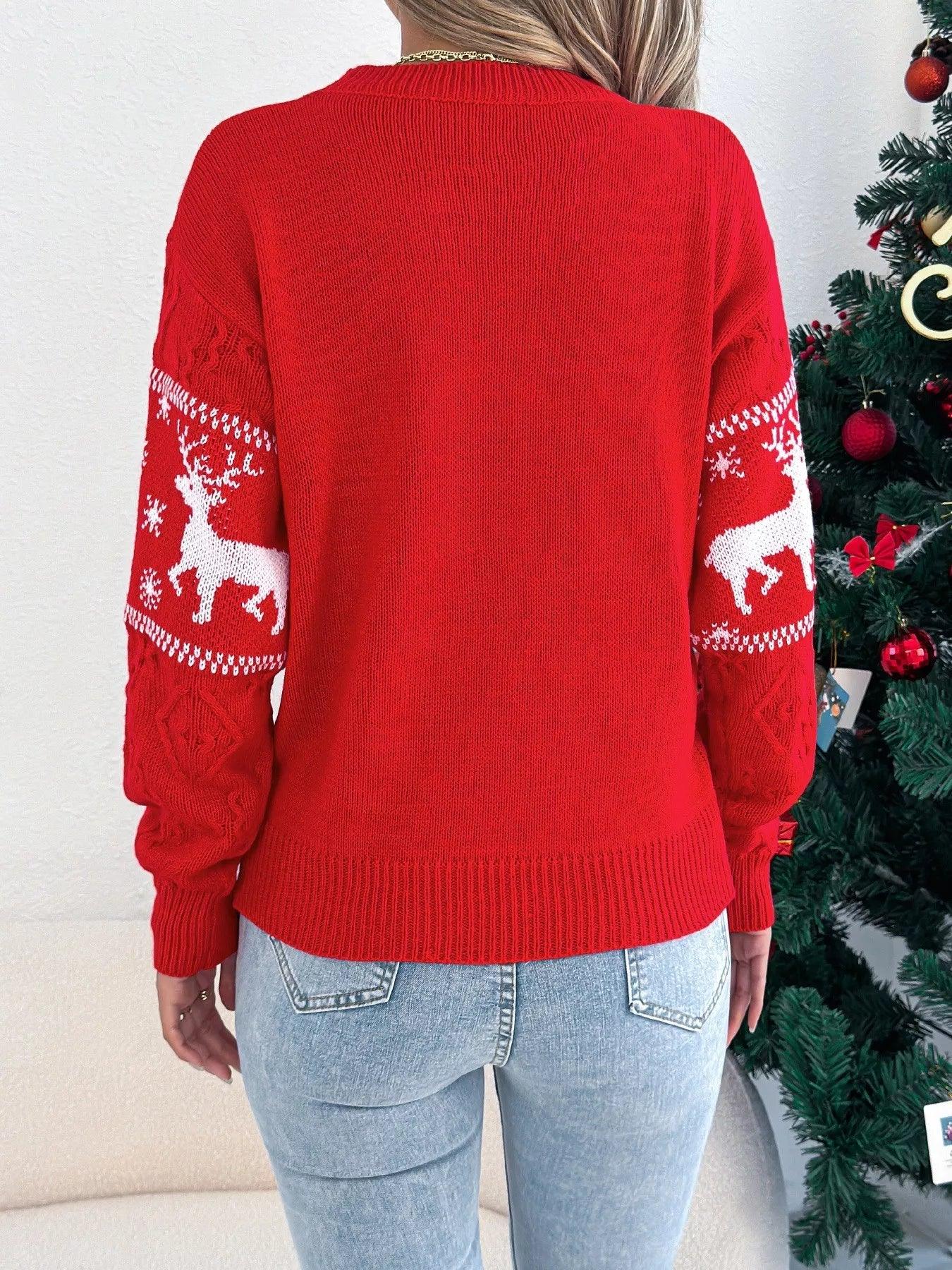 Back view of a red festive knit sweater with reindeer and snowflake pattern