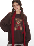 Front view of the cozy oversized knit sweater.