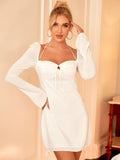 Front view of a woman in a white party dress with a drawstring detail at the bust.