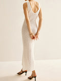 Close-up of the knit pattern on a white maxi dress