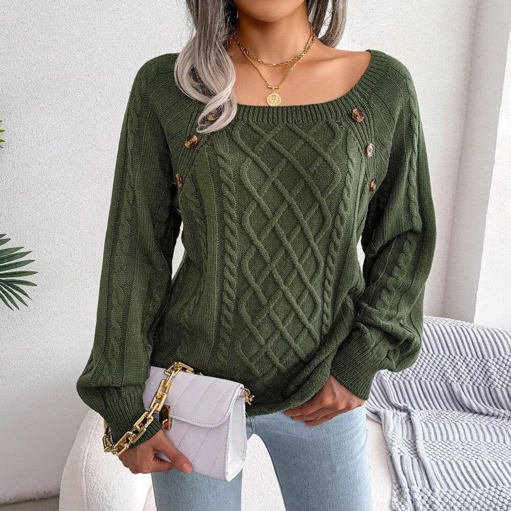 Woman wearing a green cable knit sweater with a square neckline and balloon sleeves Main image