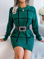 woman sitting in a green plaid knit dress