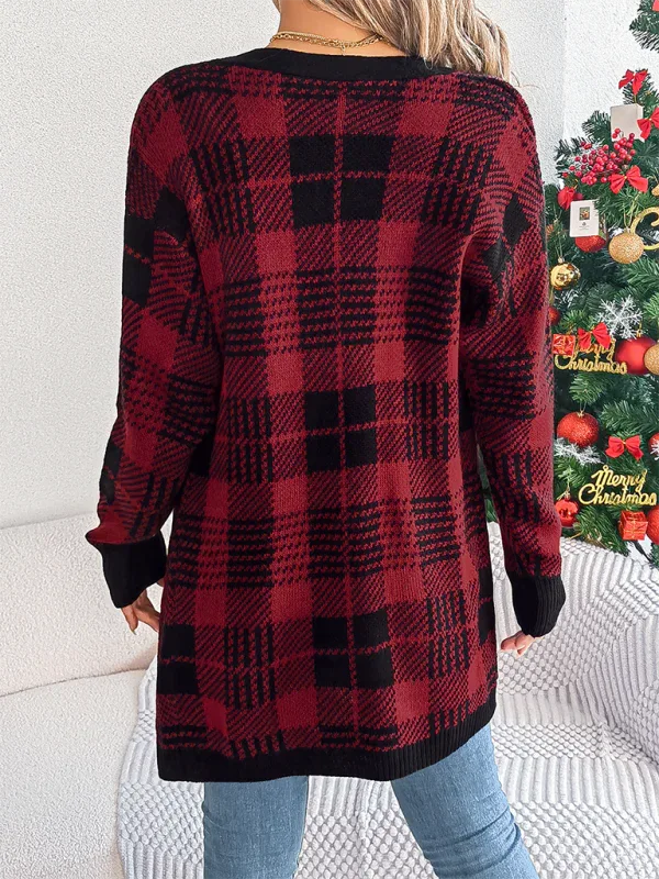 Back view of a woman in a red and black plaid knit cardigan.
