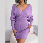 Close-up of the ribbed texture on a purple sweater dress