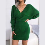 Green knit wrap mini dress with V-neck and bishop sleeves, front view