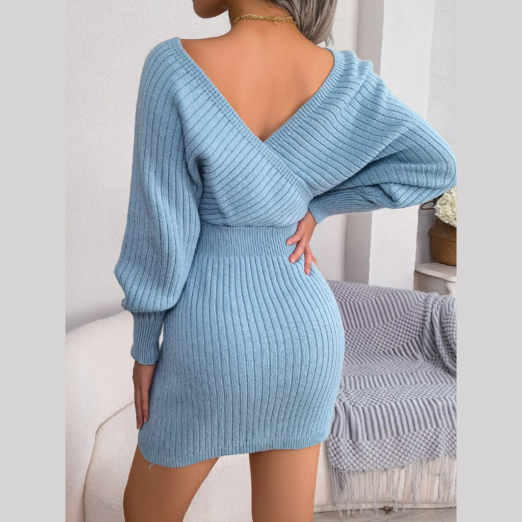 Back view of a blue ribbed knit wrap dress