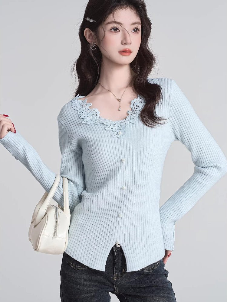 Woman wearing a light blue ribbed knit cardigan with lace trim neckline and cuffs