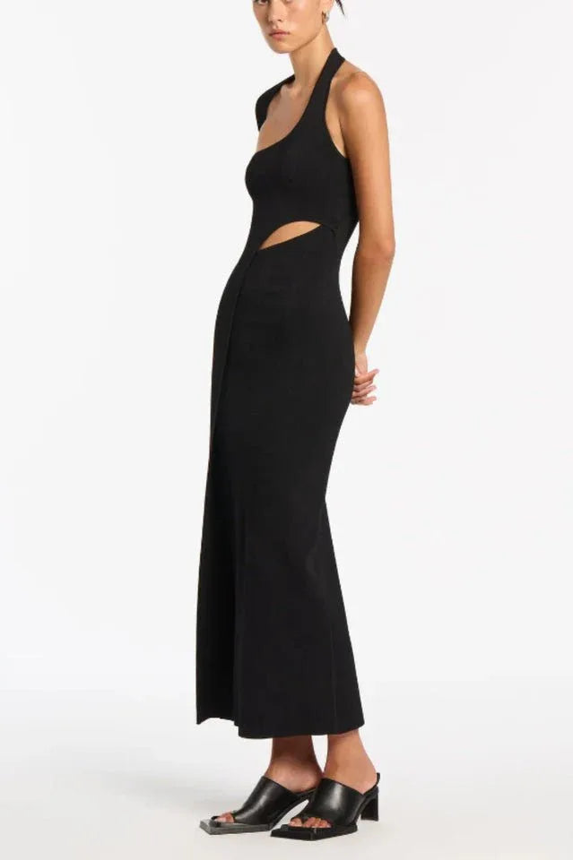 Side view of a black asymmetrical one-sleeve column gown