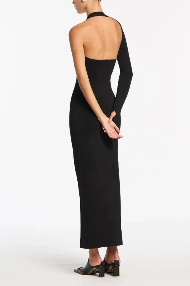 Back view of a black asymmetrical one-sleeve column gown