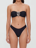 Black strapless bikini top with silver oyster shell detail and matching high-cut bottoms, front view