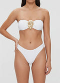 White strapless bikini top with gold oyster shell detail and matching high-cut bottoms, front view
