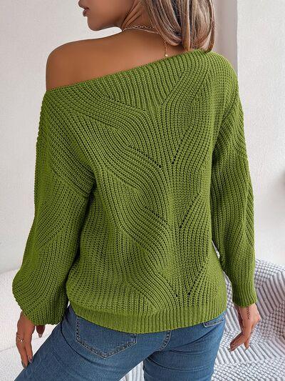 Back view of green off-the-shoulder knit sweater