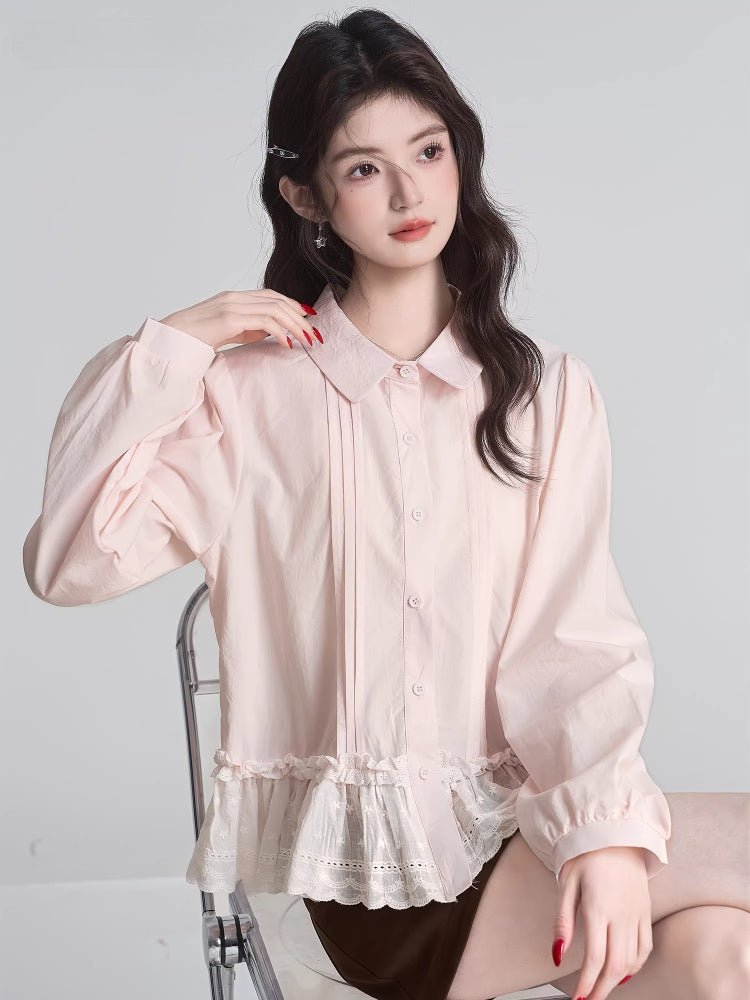 Woman wearing a pink long-sleeved peplum blouse with pintuck detailing and a ruffled lace hem.