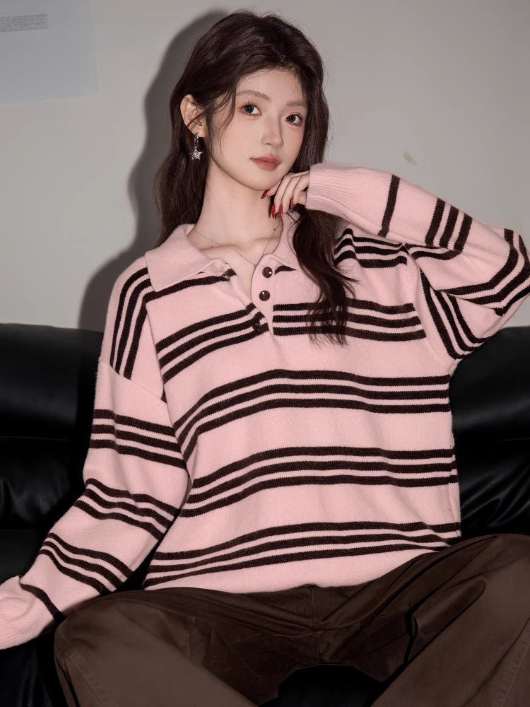 Close-up of a woman in a pink and brown striped polo sweater