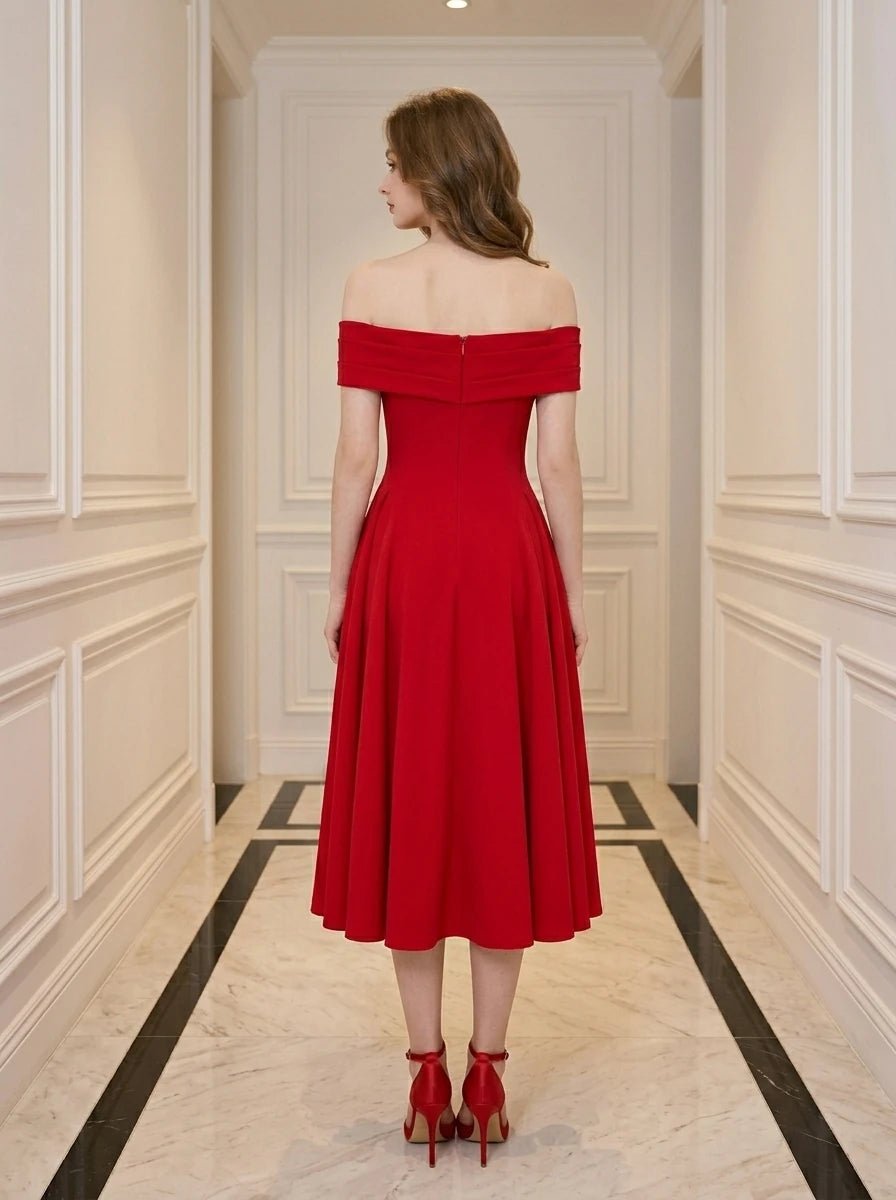 Back view of a woman in a red off-the-shoulder midi dress.
