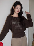 Fashionable brown graphic print long-sleeve t-shirt.