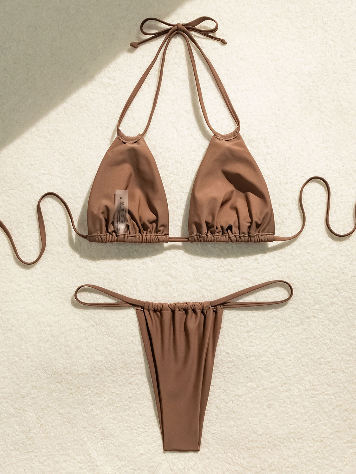 Brown bikini set with adjustable ties and cinched detailing