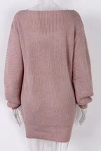 Mannequin displaying a pink off-the-shoulder knit tunic sweater, back view