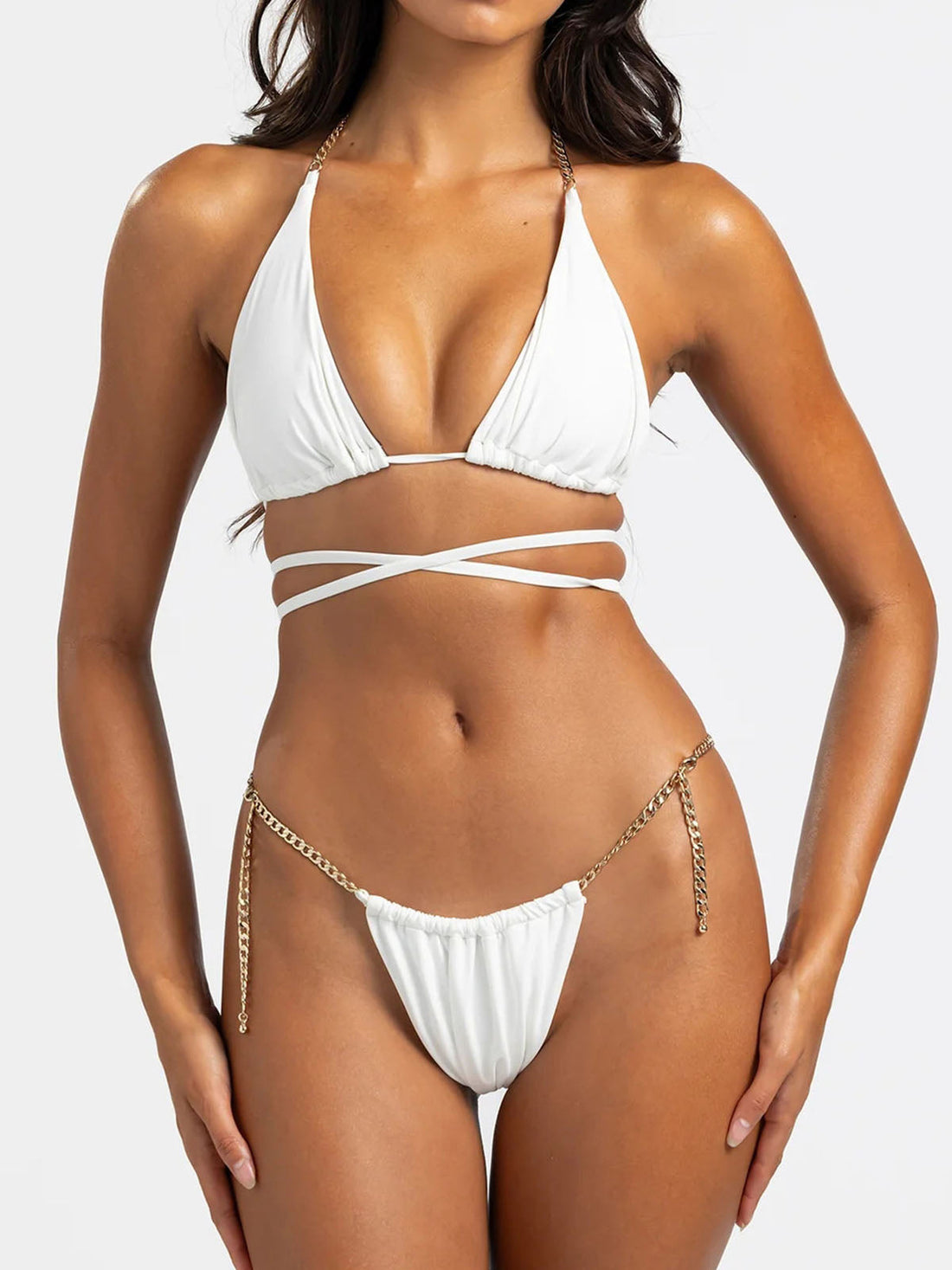 Black triangle bikini top with gold chain accents and wrap-around ties