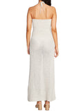 Woman wearing a white crochet knit strapless maxi dress with a cutout and tie detail at the bust, back view