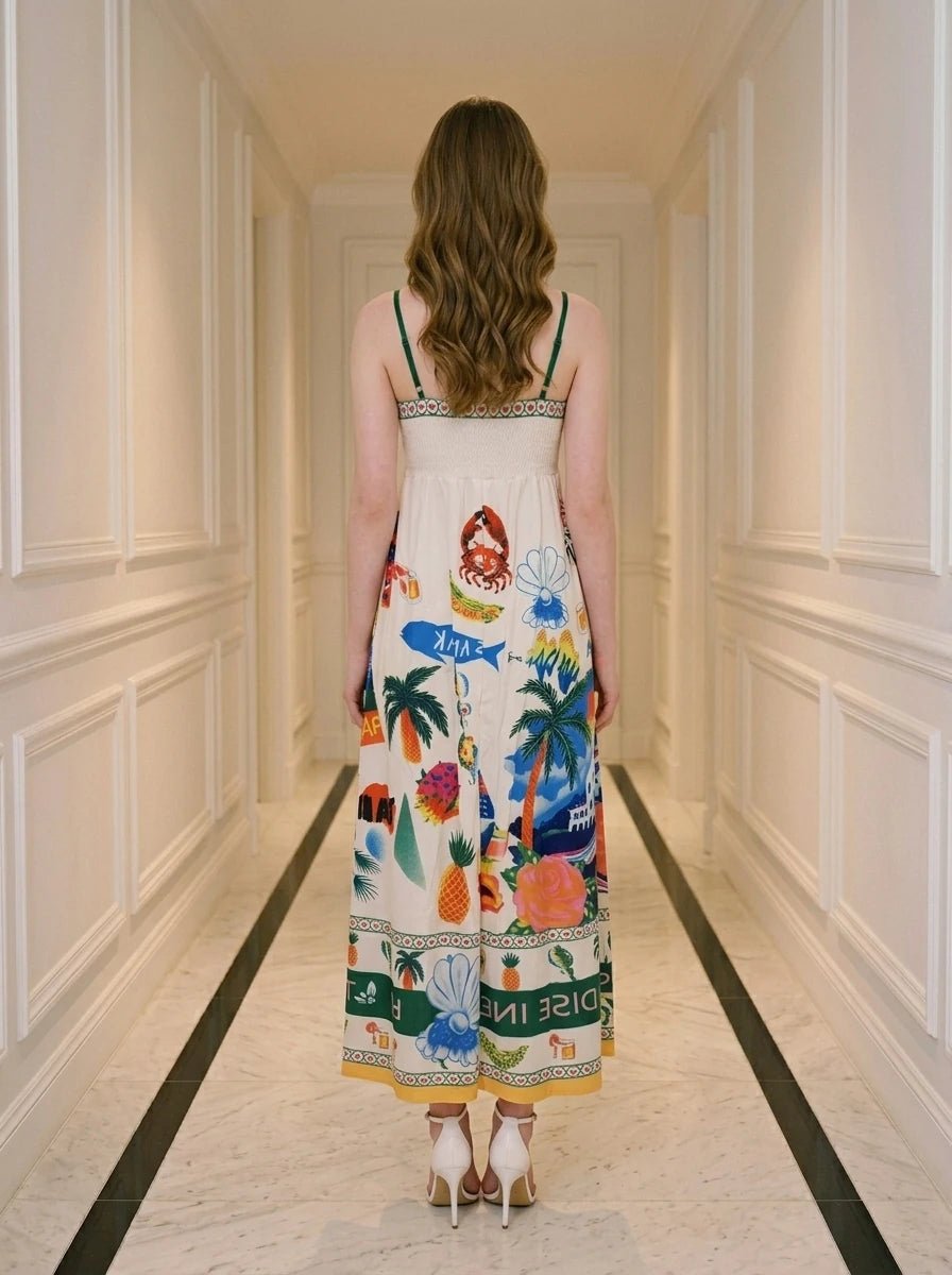 Back view of a woman wearing a white midi dress with a tropical print, standing in a hallway.